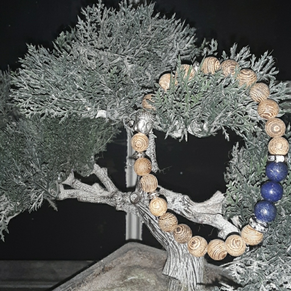 Wooden beaded bracelet with buddha head
